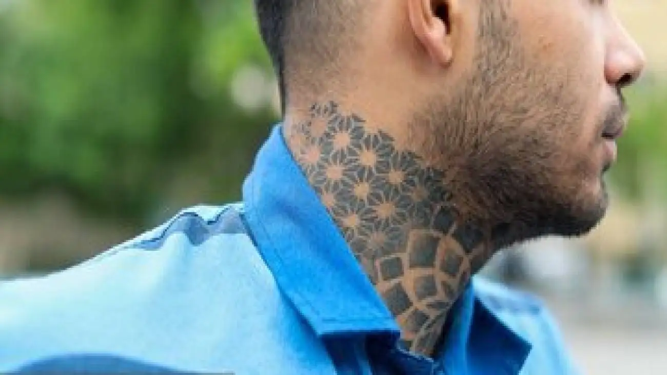 تصویر  -  از صلیب تا سلطان جنگل؛ خالکوبی های سارق و زورگیر خشن!