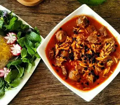 خورشت خلال کرمانشاه : طعمی از تاریخ با خلال بادام و زرشک سیاه