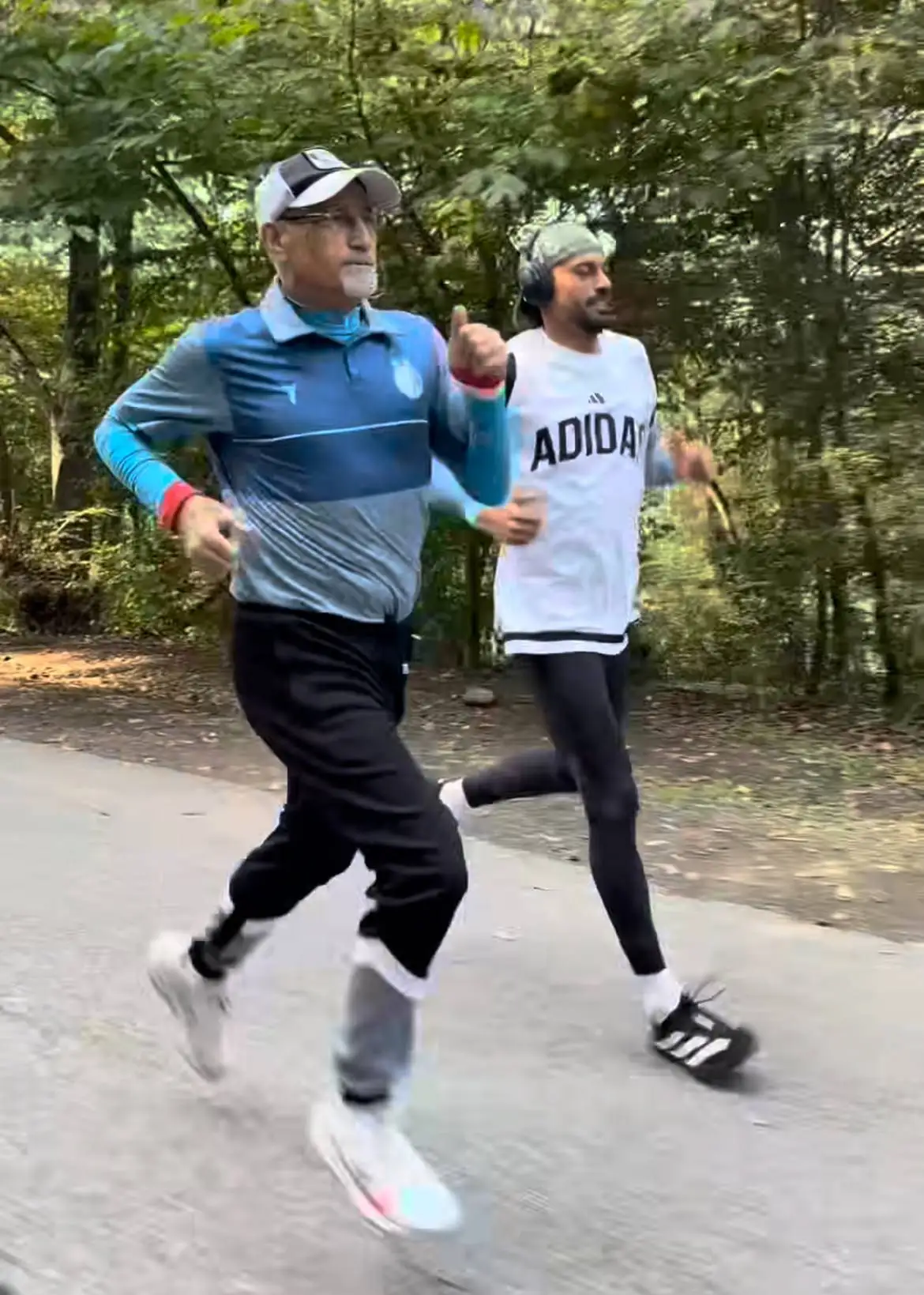 عکس - لباس استقلال بر تن پدر پرسپولیسی رامین رضاییان