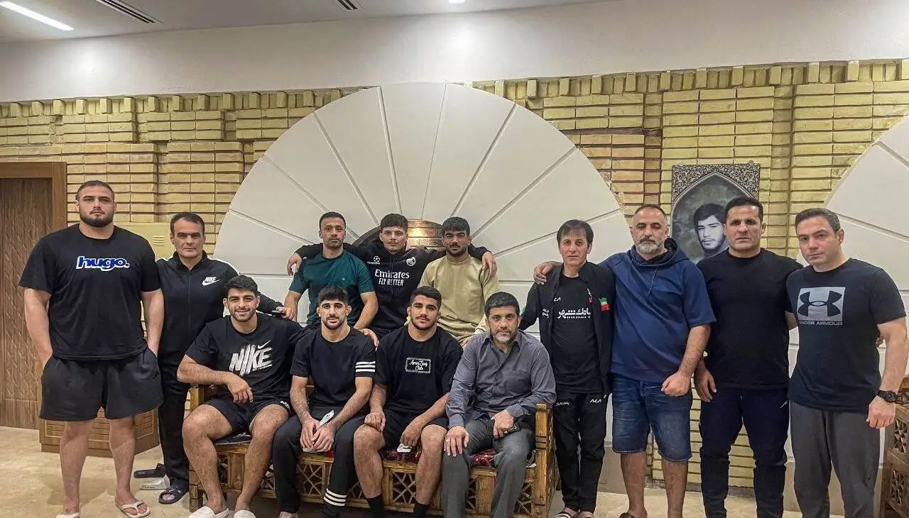 عکس - قهرمان المپیک در جمع قهرمانان دنیا: شما بهترین هستید