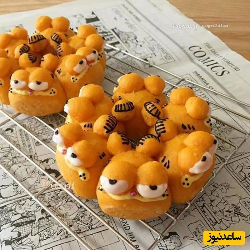 خلاقیت خاص یک شاطر با پختن نان های فانتزی و 3 بعدی بامزه و عروسکی - نونوایی رو به عروسک فروشی تبدیل کرد+عکس